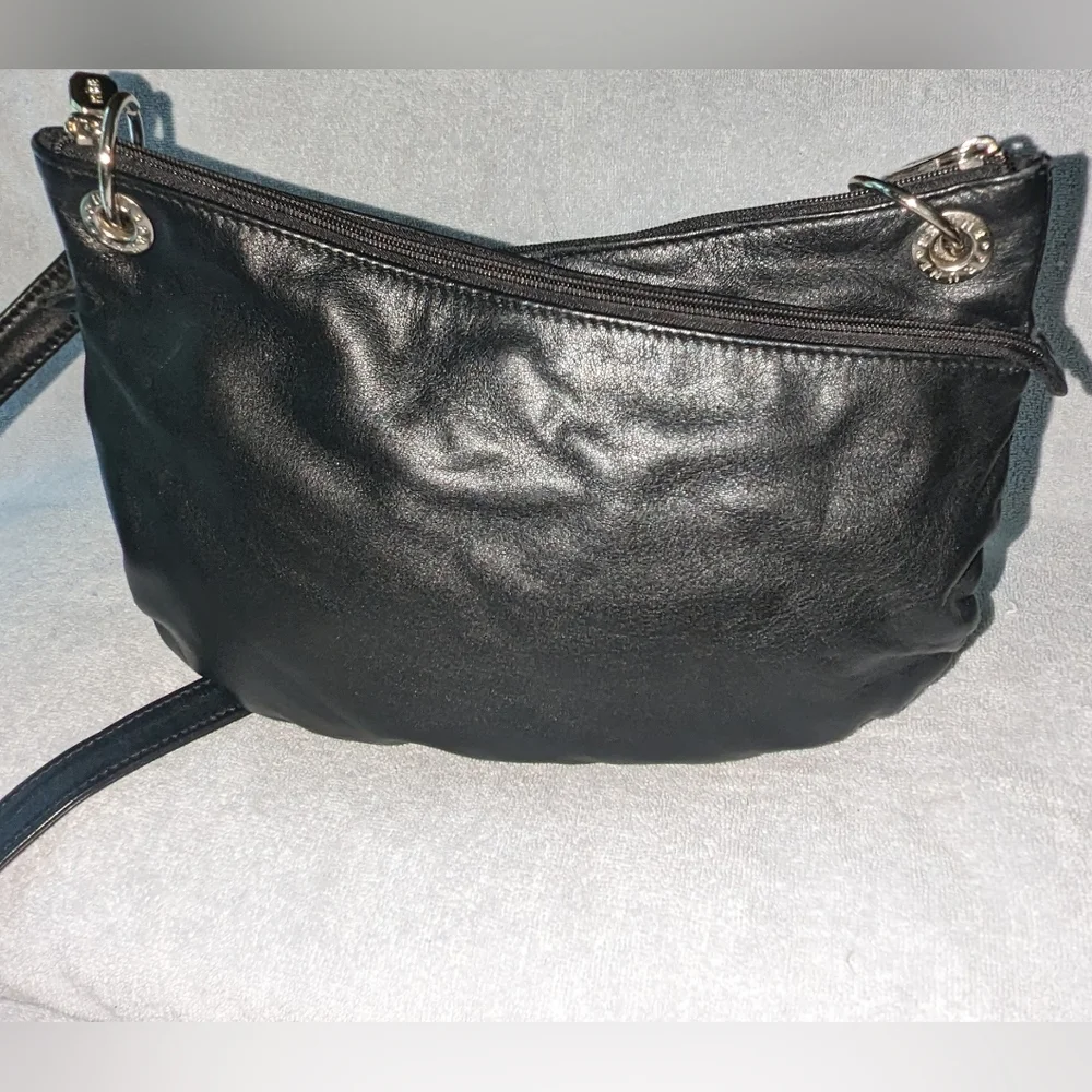 PRUNE black leather double zipper shoulder bag.